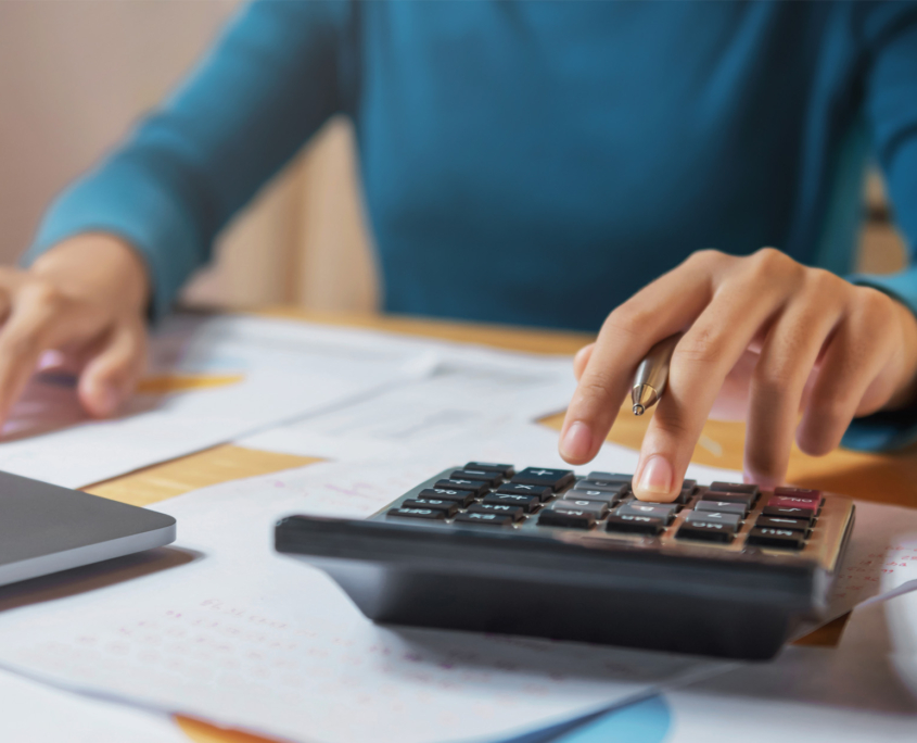 close up accountant and calculator working