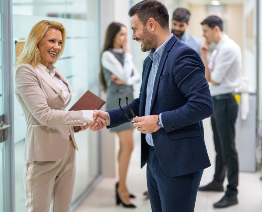 business partners handshake making deal agreement