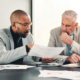 Finance, meeting or business people with paperwork for planning for teamwork